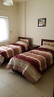 Cozy Dair Ghbar Apartments