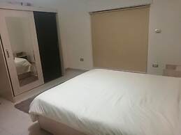 Cozy Dair Ghbar Apartments