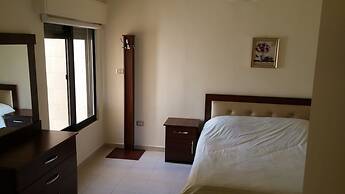 Cozy Dair Ghbar Apartments
