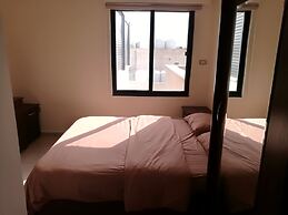 Cozy Dair Ghbar Apartments