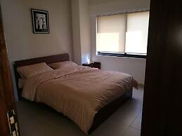 Cozy Dair Ghbar Apartments