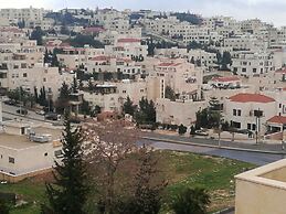 Cozy Dair Ghbar Apartments