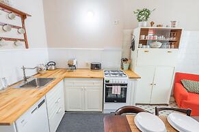 Riverside Apartment With A Balcony