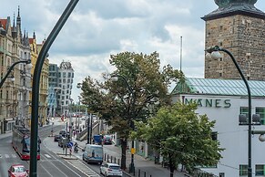 Riverside Apartment With A Balcony