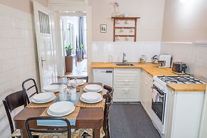 Riverside Apartment With A Balcony