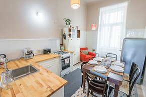 Riverside Apartment With A Balcony