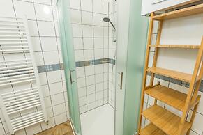 Riverside Apartment With A Balcony