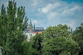 Riverside Apartment With A Balcony