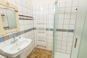 Riverside Apartment With A Balcony