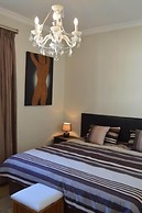 African Palm Cottage