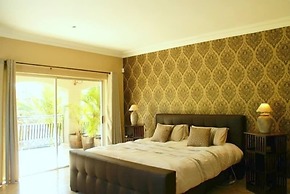 African Palm Cottage