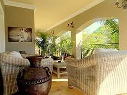 African Palm Cottage