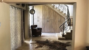 African Palm Cottage