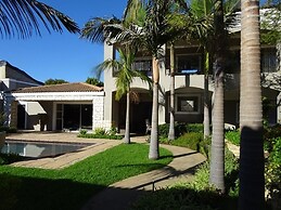 African Palm Cottage