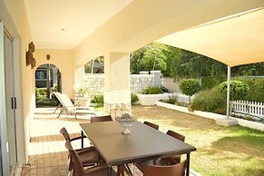 African Palm Cottage