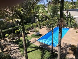 African Palm Cottage