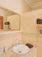 African Palm Cottage