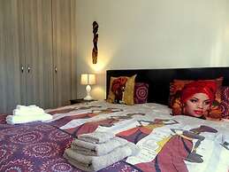 African Palm Cottage