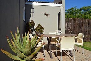 African Palm Cottage