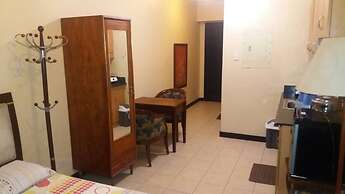 Migz N Tons Place at Cypress Towers