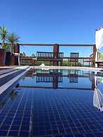 Thaiji Pousada e Parador