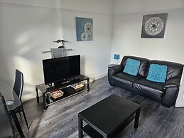 Snug - Meadhan Apartment