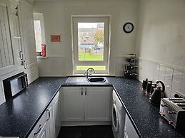 Snug - Meadhan Apartment