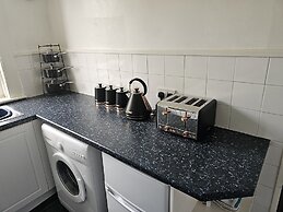 Snug - Meadhan Apartment