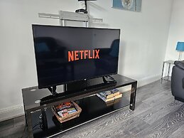 Snug - Meadhan Apartment