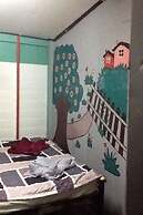 New Phiman Riverview Guesthouse - Hostel