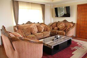 Emmad Apartment Hotel