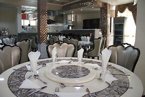 Emmad Apartment Hotel