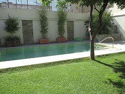 Apartamento Bizcocheros con piscina y jardin