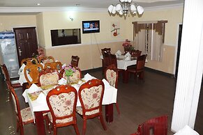 NEW POINT HOTEL AND SUITES