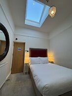 The Old Fourpenny Shop Hotel