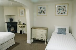 The Old Fourpenny Shop Hotel