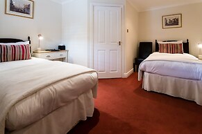 The Old Fourpenny Shop Hotel
