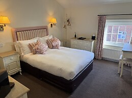 The Old Fourpenny Shop Hotel