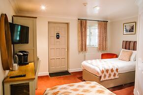 The Old Fourpenny Shop Hotel