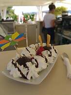 Apartments Kuce Lekovica snack bar- Bistro & Beach