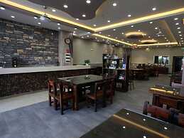 Shell Qionghai Boao Town Binhai Road Hotel