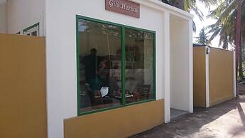 White Coconut Cottage