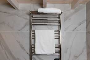 Olympic Apartments 65-67