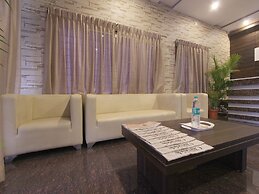 Hotel & Suites by Habitat