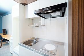 Mr. Kinjo inn D-buil