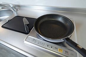 Mr. Kinjo inn D-buil