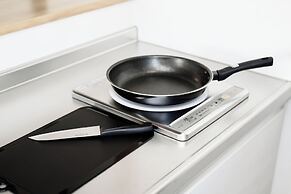 Mr. Kinjo inn D-buil