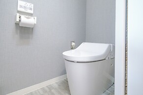 Mr. Kinjo inn D-buil