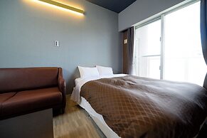 Mr. Kinjo inn D-buil