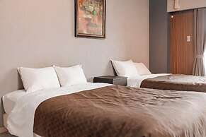 Mr. Kinjo inn D-buil